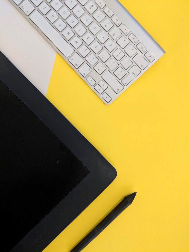 laptop pen and keyboard