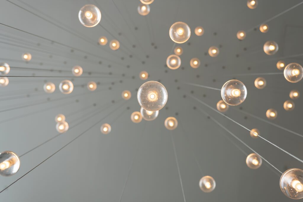multiple lightbulbs across room to talk about creative websites